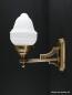 Preview: Historismus Wandlampe aus massivem Messingguss goldbraun patiniert mit satiniertem Schirm 1xE27/40W