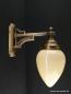 Preview: Wandlampe aus massivem Messingguss goldbraun patiniert mit elfenbeinfarbenen Schirm 1xE27/40W nach unten