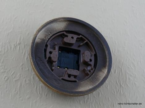 Preview: Garby Aus-Wechsel Porzellandrehschalter schwarz im Einfachrahmen Porzellan schwarz von hinten