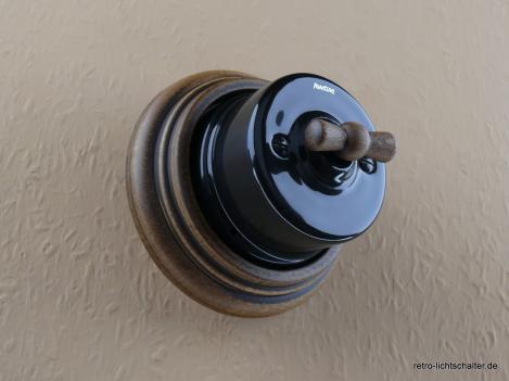 Garby Aus-Wechsel Porzellandrehschalter schwarz im Einfachrahmen Holz Buche gealtert