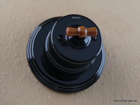 Preview: Garby Aus-Wechsel Porzellandrehschalter schwarz im Einfachrahmen Porzellan schwarz von vorn