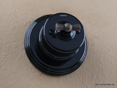 Preview: Garby Aus-Wechsel Porzellandrehschalter schwarz im Einfachrahmen Porzellan schwarz von vorn