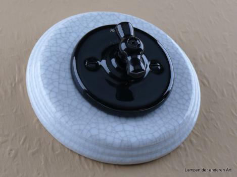 Preview: Garby Colonial Porzellandrehtaster schwarz im Einfachrahmen Porzellan craquele, von vorn