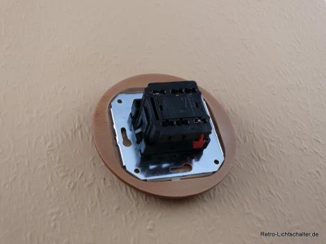 Preview: Garby Colonial Aus-Wechsel Porzellandrehschalter schwarz im Einfachrahmen Holz Buche honigfarben Knebel Retro schwarz von hinten