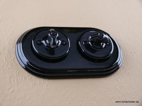 Preview: Garby Colonial 2fach Kombination, zwei Aus-Wechsel-Porzellandrehschalter schwarz,  Knebel Porzellan schwarz Retroform