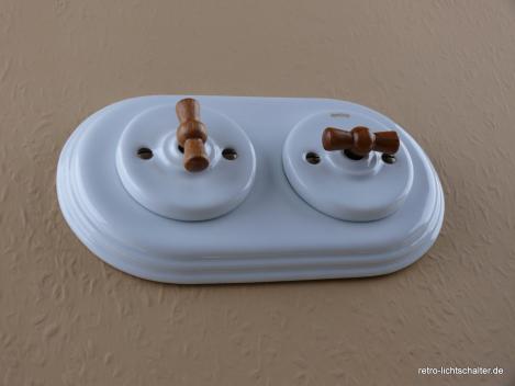 Preview: Garby Colonial 2fach Kombination, zwei Aus-Wechsel-Porzellandrehschalter weiß,  Knebel Holz Buche honigfarben