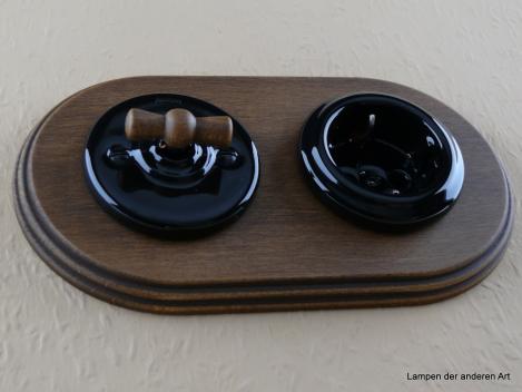 Preview: Garby Colonial 2fach Kombination Rahmen Massivholz Buche gebeizt, Aus-Wechsel-Porzellandrehschalter schwarz,  Knebel Holz Buche gealtert, Steckdoseneinsatz Porzellan schwarz