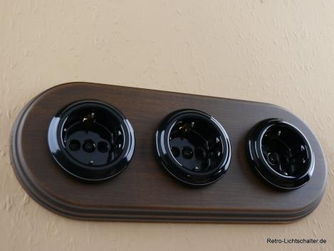 Preview: Garby Colonial 3fach Steckdose Porzellan schwarz, 3fach Rahmen Holz Buche gealtert
