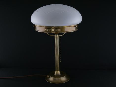 Pilzleuchte im Jugendstil aus Messing goldbraun patiniert mit geschliffenem Kuppelschirm, Auflagering mit umlaufendem Perlfries und Ornamenten, 1xE27/60W