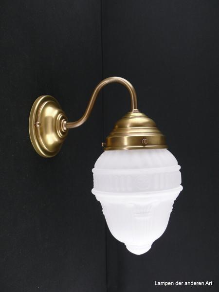 Schlichte Jugendstil Wandleuchte mit geschwungenem Arm, Material Messing - hell patiniert, Glaszapfen grau satiniert, 1xE27/40W, Spiegel-Badlampe nach unten