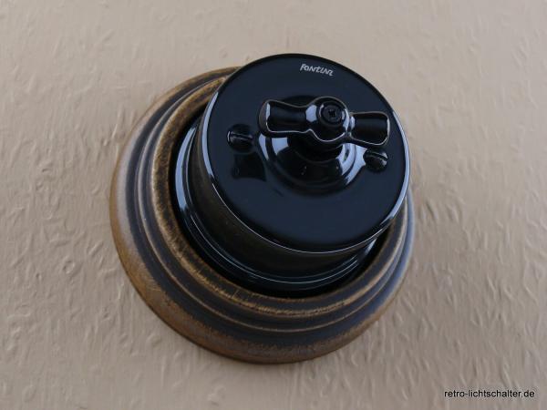 Garby Aus-Wechsel Porzellandrehschalter schwarz im Einfachrahmen Porzellan schwarz von vorn