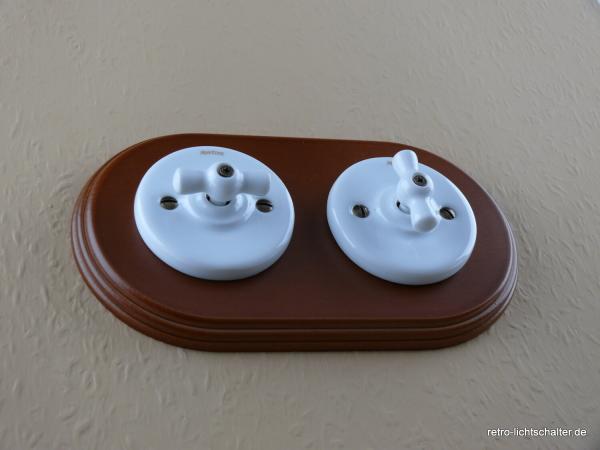 Garby Colonial 2fach Kombination, 2fach Rahmen Holz Buche honigfarben, zwei Aus-Wechsel-Porzellandrehschalter weiß,  Knebel Porzellan weiß